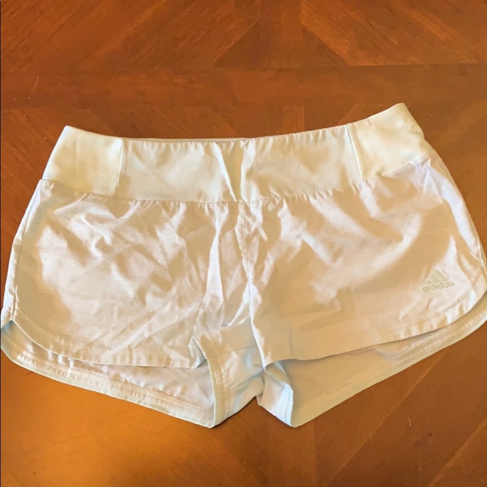 Mint colored Adidas running shorts